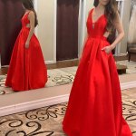 A-line Red Deep V-neck Backless Sweep Train Prom Dress with Pleats Pockets