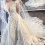 A-line Illusion Jewel Court Train Wedding Dress with Lace Appliques