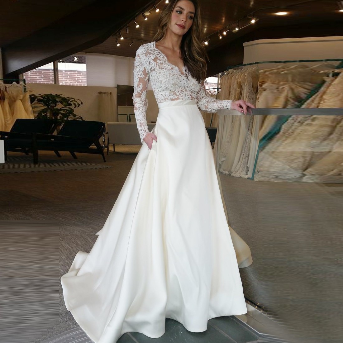A-Line V-Neck Long Sleeves Sweep Train Satin Wedding Dress with Lace Pockets